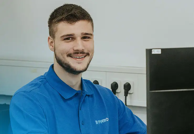 Pieron apprentice smiling at the workplace
