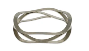 Multi-layer wave spring in the damper